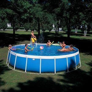 Family playing in an above ground pool